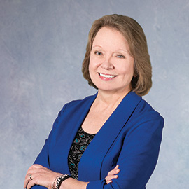 The Story of AIU's Dr. Judy Bullock: How an Administrative Assistant Climbed the Ladder