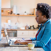 Information Retention Tips Blog Image - Woman studying on laptop