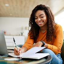 Online college student researching accredited online universities