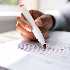 Correcting Spell And Grammar Mistake. Proofread Script. Hand. Red Marker. Editing.