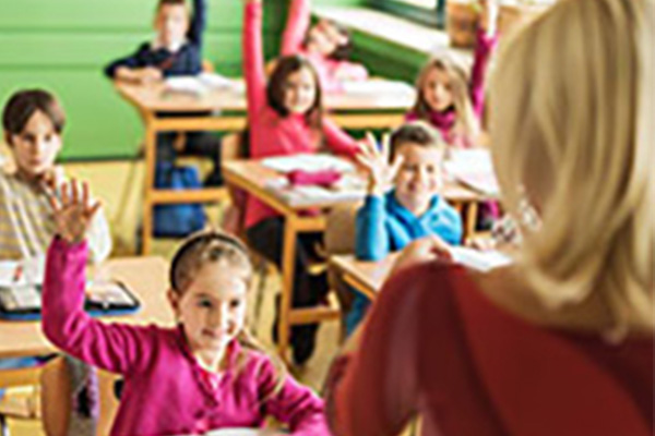 students raising hands in classroom, school supplies, teacher calling on students
