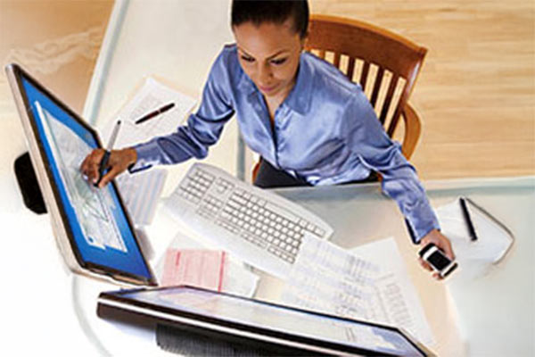 African American woman working at a desk