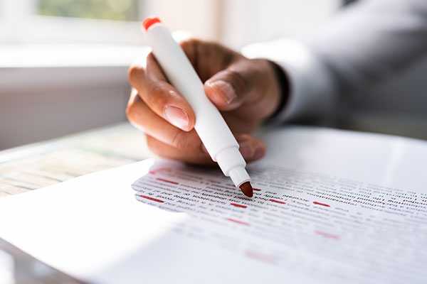 Correcting Spell And Grammar Mistake. Proofread Script. Hand. Red Marker. Editing.